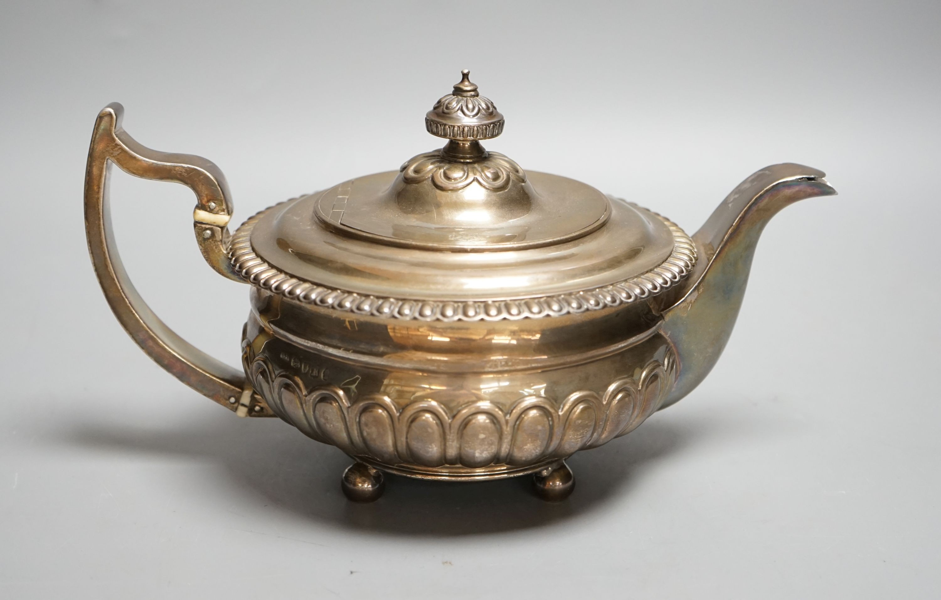 A George III silver teapot, Soloman Hougham, London, 1813, gross 23.5oz.